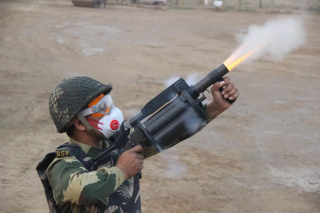 Tear Smoke Shell 2.0: भीड़ पर काबू पाने के लिए BSF इस्तेमाल करेगी नई पीढ़ी के आंसू गोले 13 BSF to Introduce Advanced Tear Smoke Shell 2.0 for Safer and More Effective Crowd Control